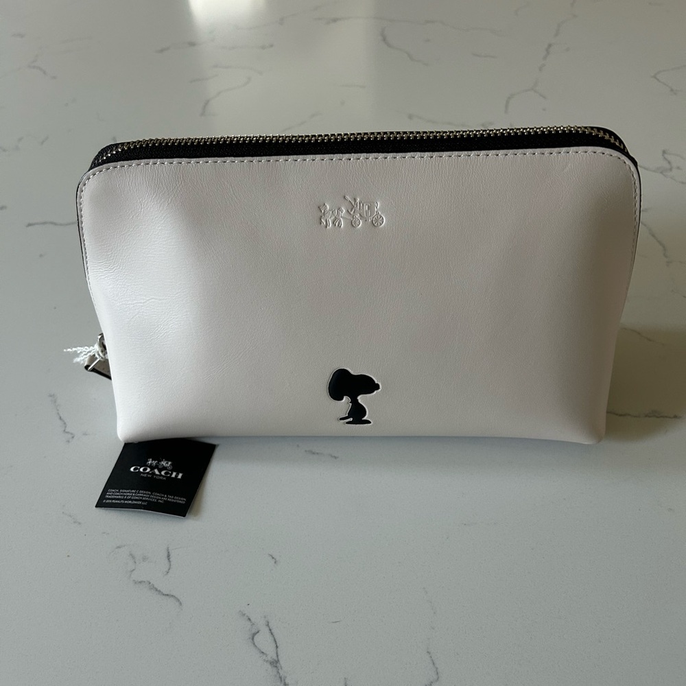 Coach x Snoopy toiletry case